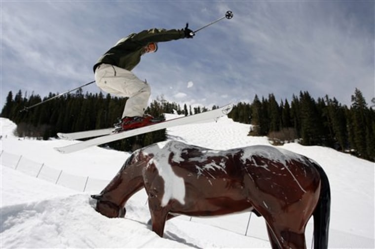 This undated photo courtesy of Winter Park/Colorado Ski Country USA shows a skier about to land on an artificial horse at Winter Park Resort in Winter Park, Colo.  Some ski resorts are turning into junkyards _ and snowboarders couldn't be happier.     (AP Photo/Winter Park/Colorado Ski Country USA)